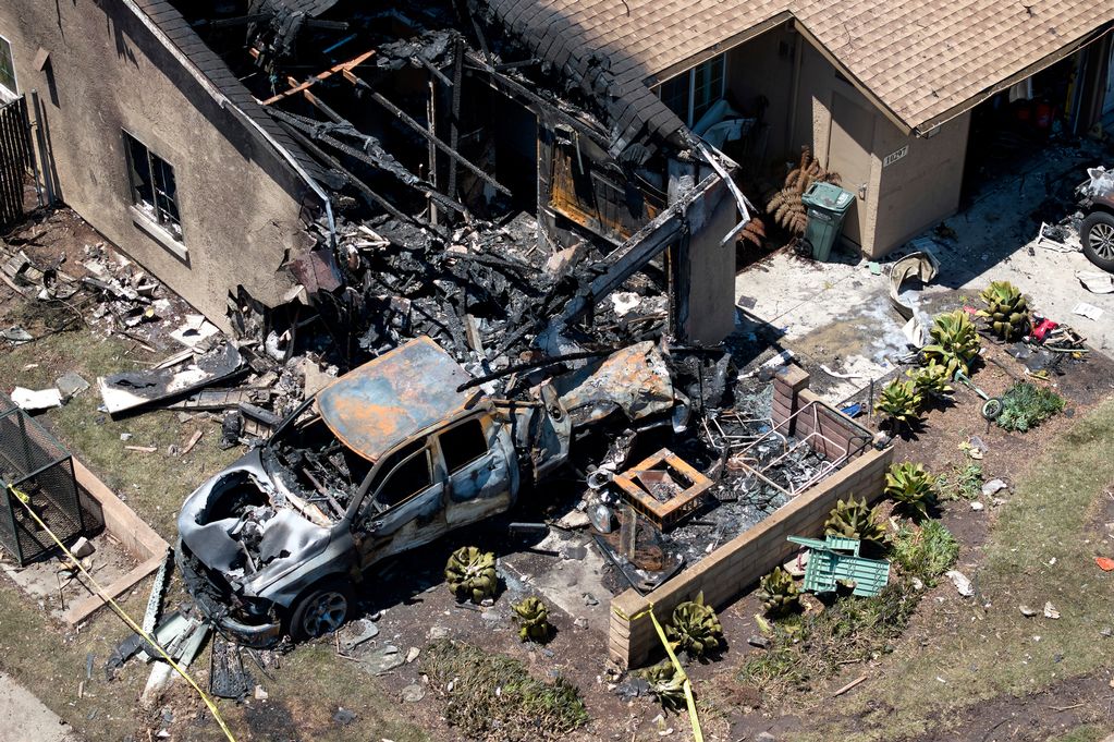 houses and cars destroyed in San Diego Plane crash